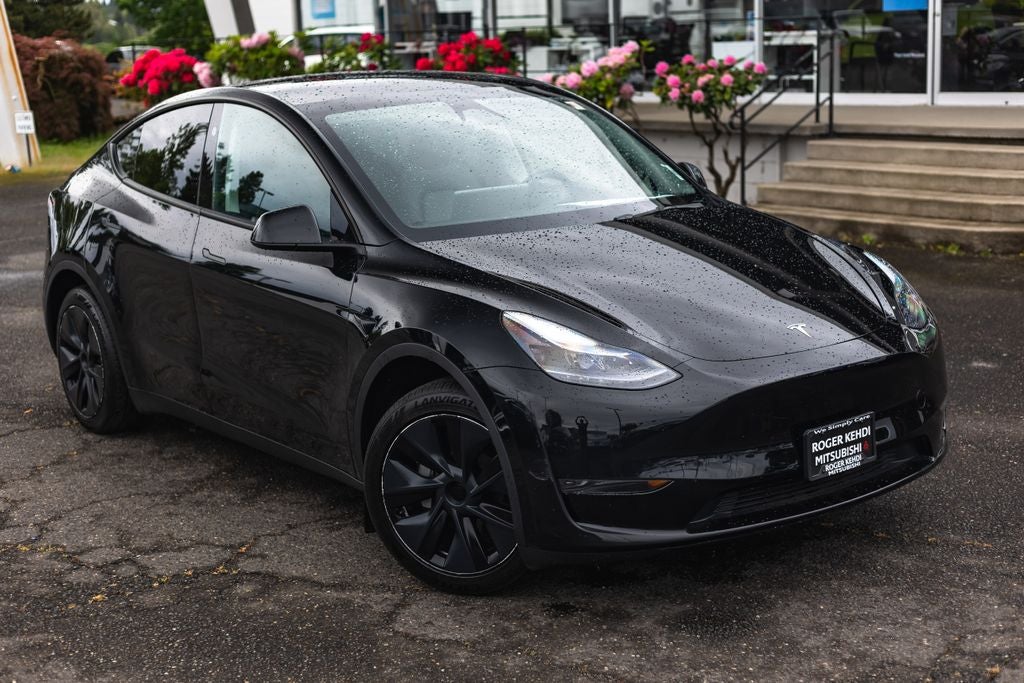 Used 2025 Tesla Model Y Long Range with VIN 7SAYGDED4SF216765 for sale in Tigard, OR