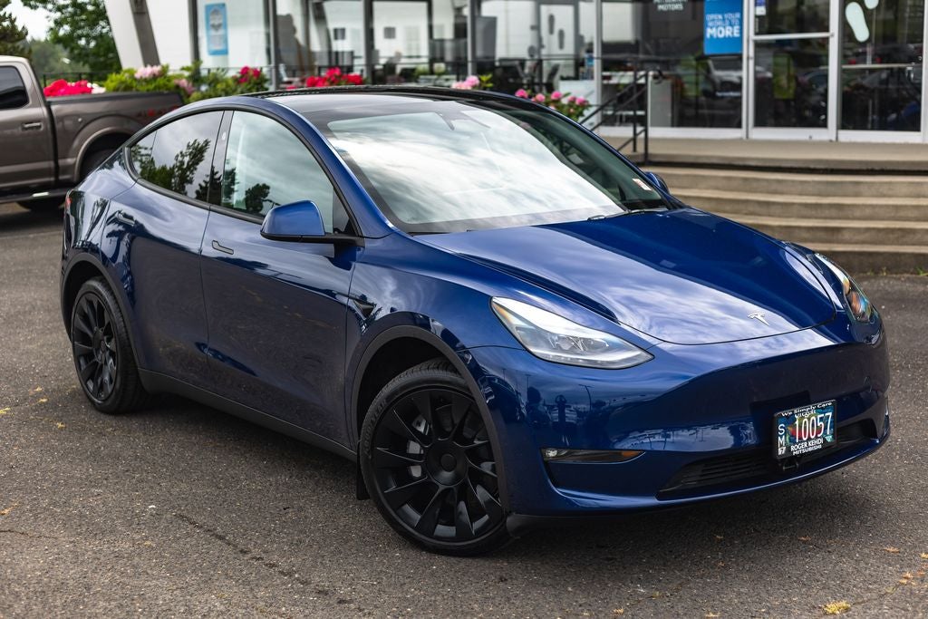 Used 2024 Tesla Model Y Long Range with VIN 7SAYGDEE2RF002022 for sale in Tigard, OR